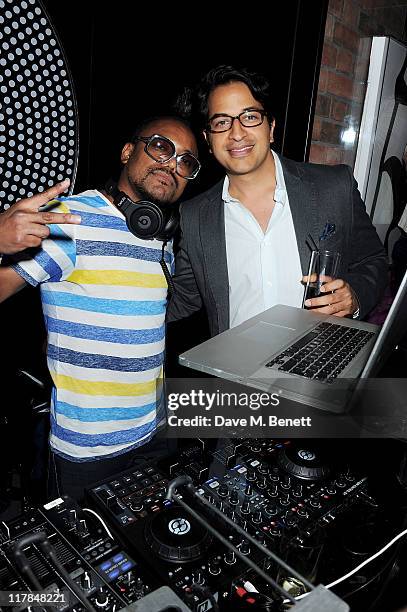 Musician Apl.de.Ap of the Black Eyed Peas and Omar Amanat pose as Apl.de.Ap performs in the Night Lounge at Morton's Club on June 30, 2011 in London,...
