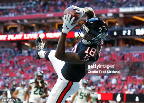 Calvin Ridley of the Atlanta Falcons converts a two point conversion with his reception in the second half of an NFL game against the Seattle...