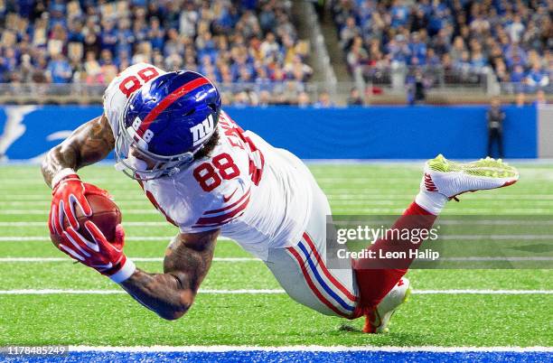Evan Engram of the New York Giants scores a third quarter touchdown during the game against the Detroit Lions at Ford Field on October 27, 2019 in...