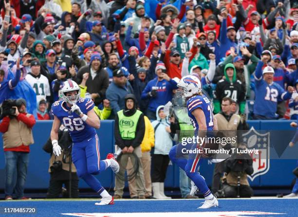Cole Beasley of the Buffalo Bills celebrates his touchdown during the first half with Dawson Knox against the Philadelphia Eagles at New Era Field on...