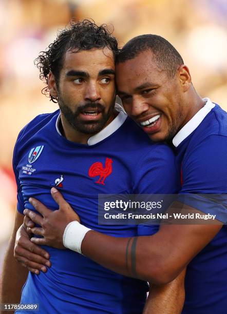 Yoann Huget of France celebrates scoring his side's first try with his team mate Gael Fickou during the Rugby World Cup 2019 Group C game between...