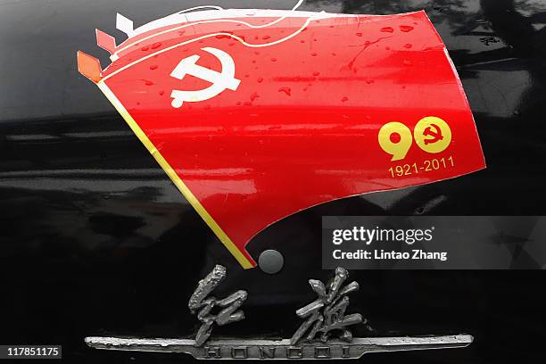 Car is displayed at the 798 Art Exhibition Commemorating CPC'S 90th Anniversary on July 1, 2011 in Beijing, China. This year's celebrations will mark...