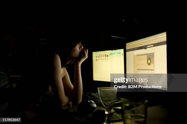 bare chest young woman using computer - asian pin up girls stock pictures, royalty-free photos & images