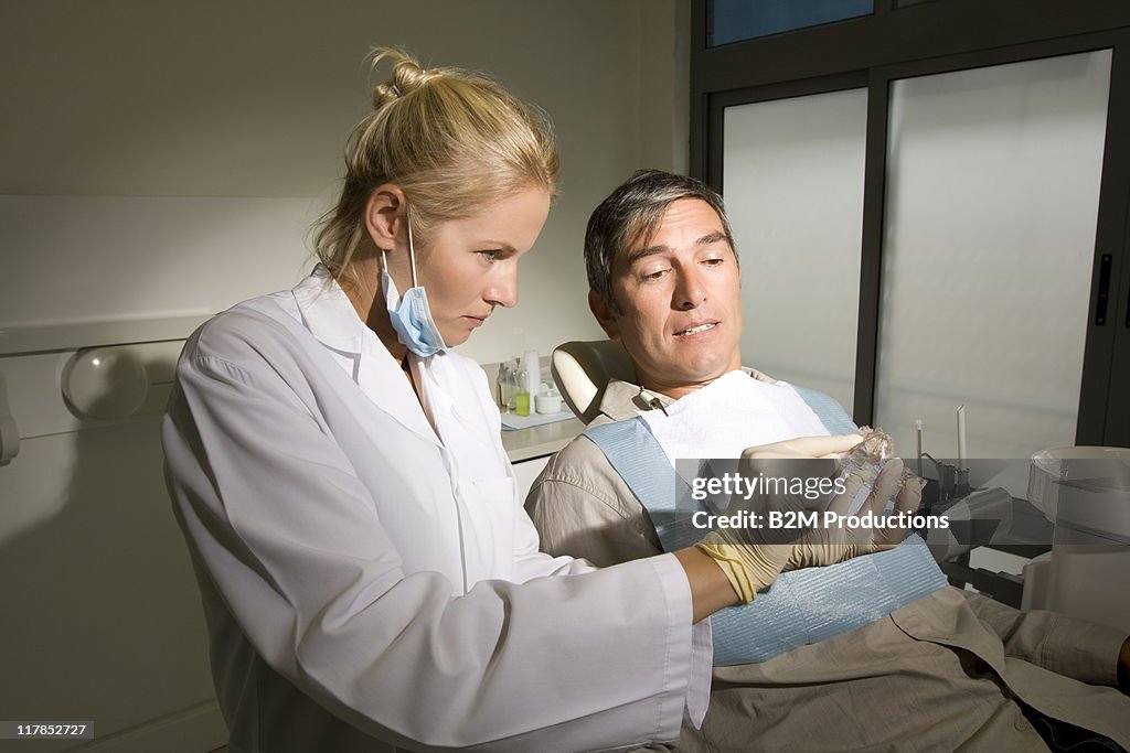 Dentist with patient