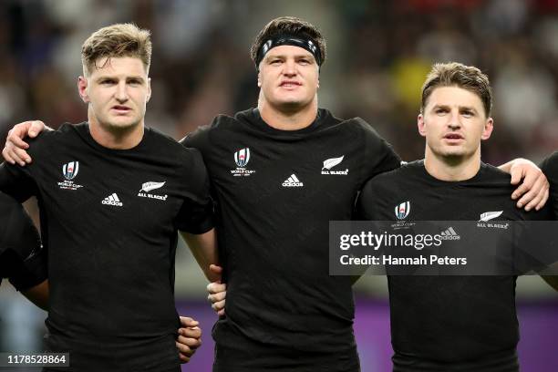 Jordie Barrett, Scott Barrett and Beauden Barrett of New Zealand line up for the national anthem prior to the Rugby World Cup 2019 Group B game...