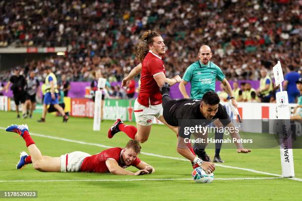 Rieko Ioane of New Zealand grounds the ball to score his side's fifth try during the Rugby World Cup 2019 Group B game between New Zealand and Canada...