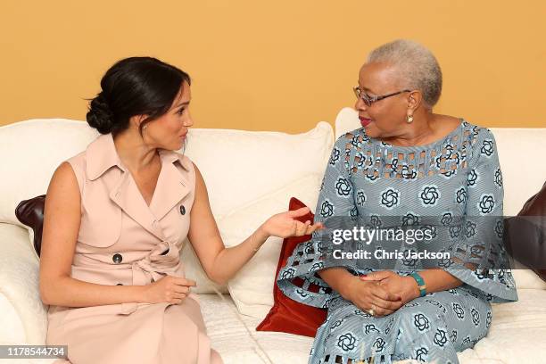 Meghan, Duchess of Sussex speaks to Graca Machel, widow of the late Nelson Mandela on October 02, 2019 in Johannesburg, South Africa. The Duke last...