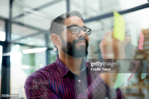 this plan is bound to be foolproof - mid adult stock pictures, royalty-free photos & images