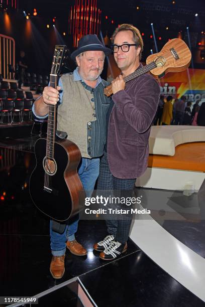 Axel Prahl and Jan Josef Liefers attend the recording of German ARD TV show 'Klein Gegen Gross - Das Unglaubliche Duell' at Studio Adlershof on...