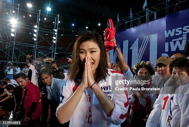 Yingluck Shinawatra greets supporters during a rally on July 1, 2011 in Bangkok, Thailand .Thai's go to the polls on July 3, in a tight race pitting...