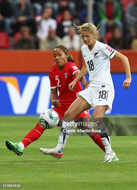 Katie Bowen of New Zealand and Alex Scott of England battle for the ball during the FIFA Women's World Cup 2011 Group B match between New Zealand and...