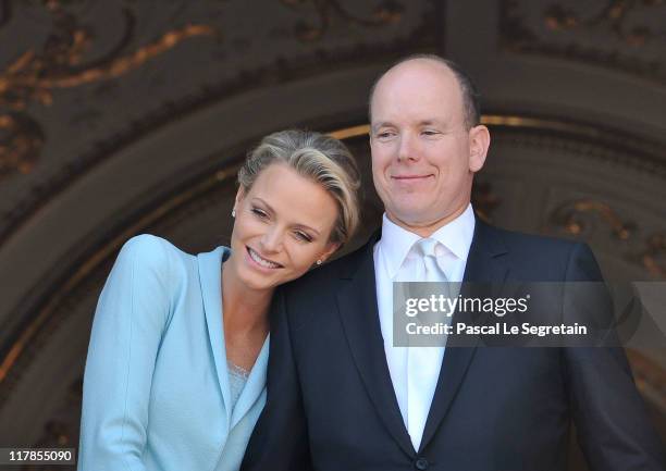 Princess Charlene of Monaco and Prince Albert II of Monaco pose on the balcony after the civil ceremony of the Royal Wedding of Prince Albert II of...