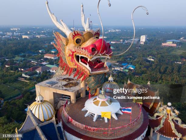 aerial view of wat samphran, dragon temple in the sam phran district in nakhon pathom province near bangkok, thailand. - wat samphran - fotografias e filmes do acervo