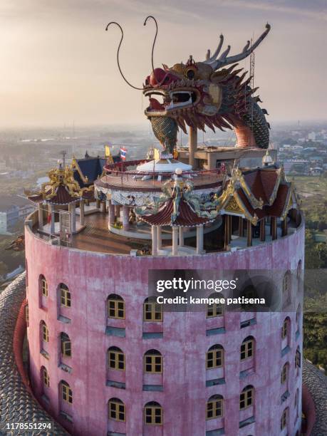 aerial view of wat samphran, dragon temple in the sam phran district in nakhon pathom province near bangkok, thailand. - wat samphran - fotografias e filmes do acervo