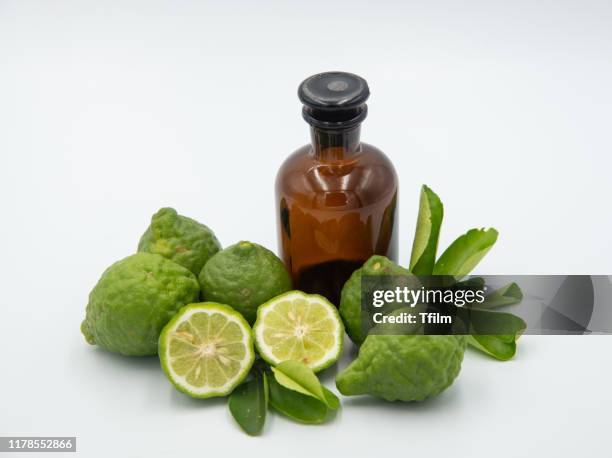 bergamot, citrus hystrix, bergamot oil, hair treatment oil on white background - bergamot stock pictures, royalty-free photos & images