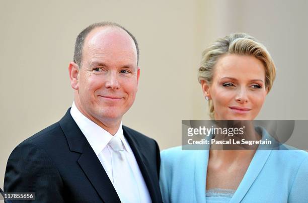 Prince Albert II of Monaco and Princess Charlene of Monaco look on after the civil ceremony of the Royal Wedding of Prince Albert II of Monaco to...