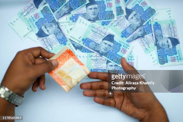 pakistani currency - pakistan currency stock pictures, royalty-free photos & images