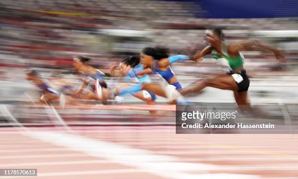 Erica Bougard of the United States competes in the Women's Heptathlon 100 metres hurdles during day six of 17th IAAF World Athletics Championships...