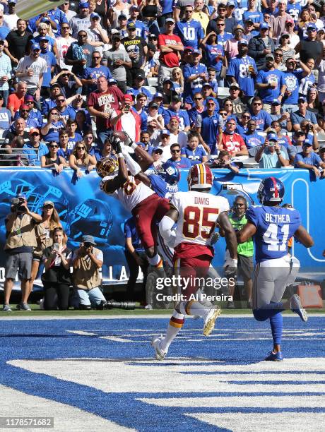 Tight End Jeremy Sprinkle of the Washington Redskins goes up for a ball against the New York Giants in the first half at MetLife Stadium on September...