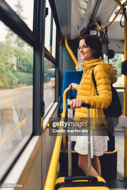 tourist woman with suitcase traveling in bus - poland people stock pictures, royalty-free photos & images