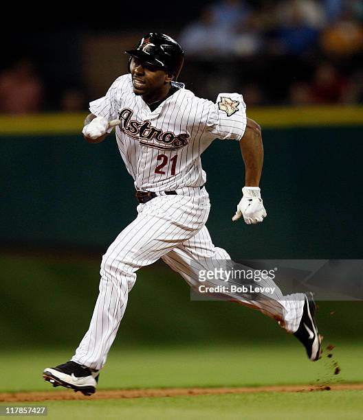 Center fielder Michael Bourn of the Houston Astros runs against the Texas Rangers at Minute Maid Park on June 28, 2011 in Houston, Texas.