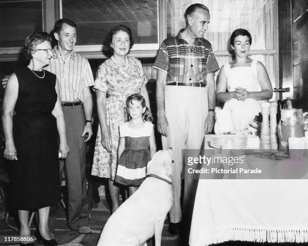 Governor of New York, and former US Ambassador to the Soviet Union, W. Averell Harriman , centre, right at home with his wife Marie Norton Harriman...
