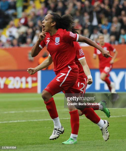 Jessica Clarke of England celebrates after scoring her team's 2nd goal wth her team mate Karen Carney during the FIFA Women's World Cup Group B match...