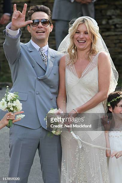 Kate Moss and Jamie Hince outside the church after their wedding on July 1, 2011 in Southrop, England.