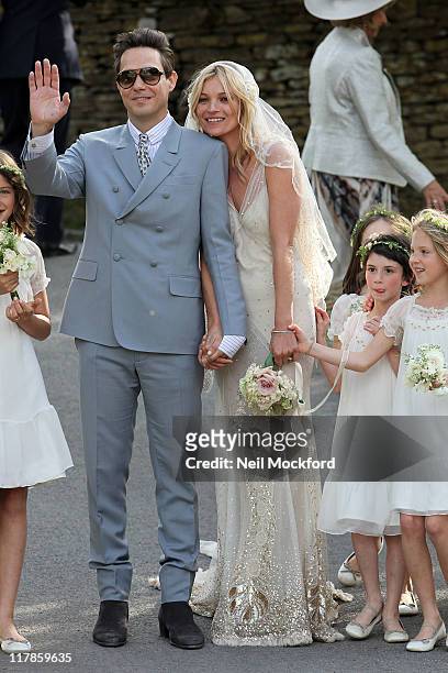 Jamie Hince and Kate Moss outside the church after their wedding on July 1, 2011 in Southrop, England.