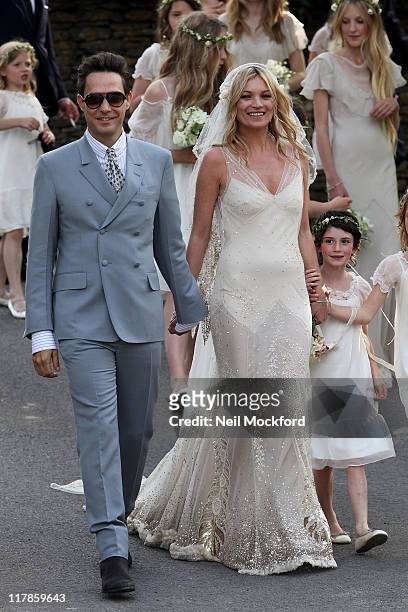 Jamie Hince and Kate Moss outside the church after their wedding on July 1, 2011 in Southrop, England.