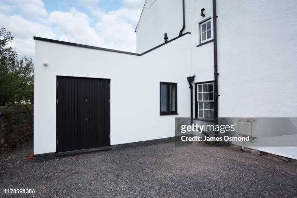modern extension built onto the side of a listed period property, completed project. - façade stock pictures, royalty-free photos & images