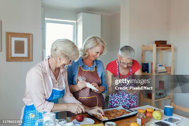 having fun while baking - international womens day 2019 stock pictures, royalty-free photos & images