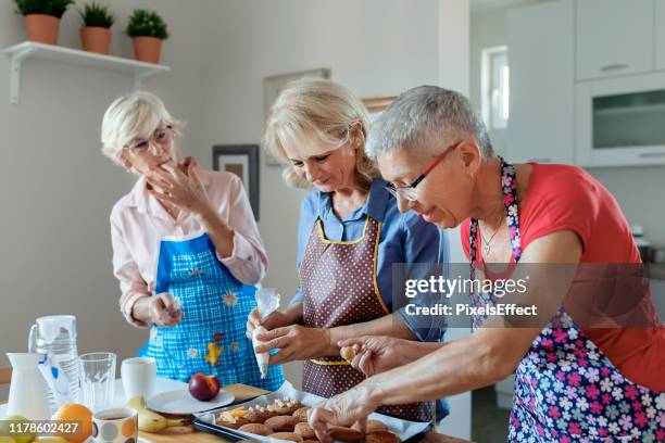 seniors spending time together - international womens day 2019 stock pictures, royalty-free photos & images