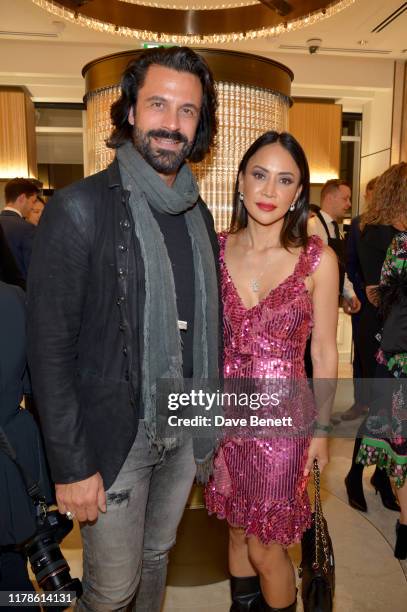 Christian Vit and Vicky Lee attend the re-opening of the Mikimoto Bond Street Boutique on October 02, 2019 in London, England. Guests were welcomed...