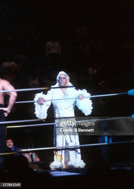 The "Nature Boy" Rick Flair steps into the ring before his Heavy Weight bout against Road Warrior Hawk during the 1988 Bunkhouse Stampede on January...