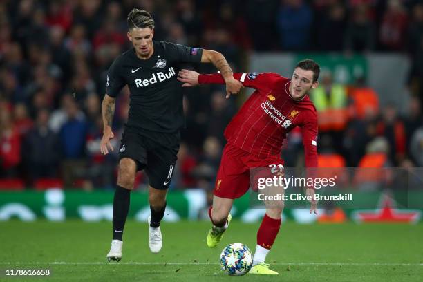 Andy Robertson of Liverpool anc Dominik Szoboszlai of Red Bull Salzburg during the UEFA Champions League group E match between Liverpool FC and RB...