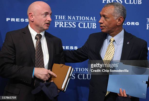 Astronaut and space shuttle commander Capt. Mark Kelly talks with NASA Administrator Charles Bolden Jr. After both men addressed the National Press...