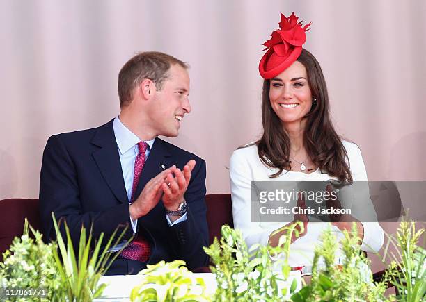 Prince William, Duke of Cambridge and Catherine, Duchess of Cambridge watch performaces on stage at Parliament Hill for Canada Day Celebrations on...