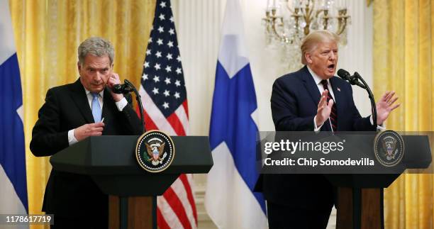 Finnish President Sauli Niinisto and U.S. President Donald Trump hold a joint news conference in the East Room of the White House October 02, 2019 in...