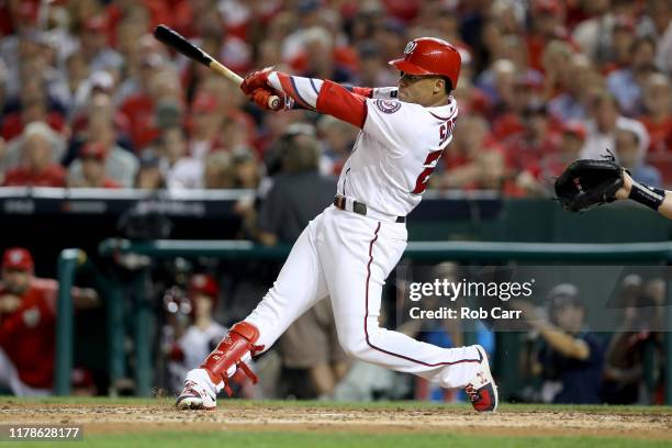 Juan Soto of the Washington Nationals bats against the Milwaukee Brewers of the National League Wild Card game at Nationals Park on October 01, 2019...