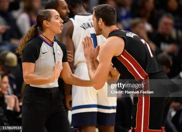 Goran Dragic of the Miami Heat speaks to referee Ashley Moyer-Gleich after being called for a foul against the Minnesota Timberwolves during the...