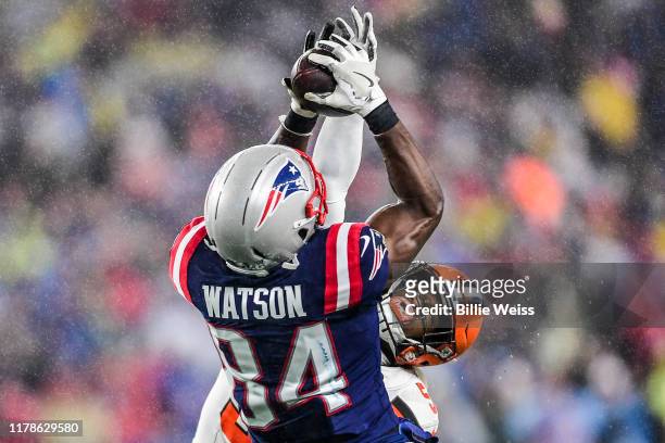 Ben Watson of the New England Patriots catches a pass as he is defended by Mack Wilson of the Cleveland Browns during a game at Gillette Stadium on...