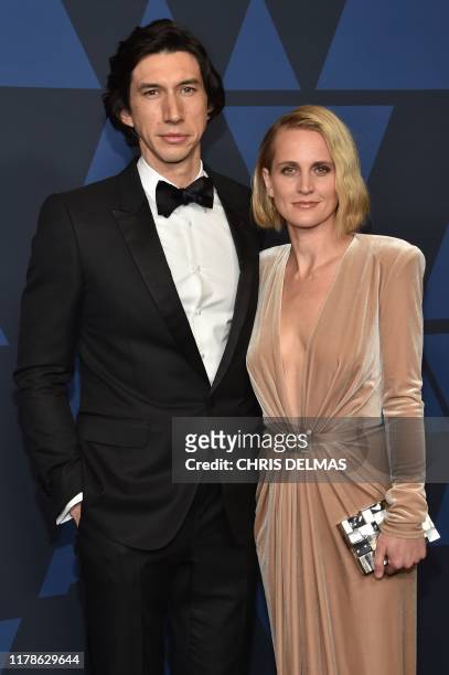 Actor Adam Driver and wife US actress Joanne Tucker arrive to attend the 11th Annual Governors Awards gala hosted by the Academy of Motion Picture...