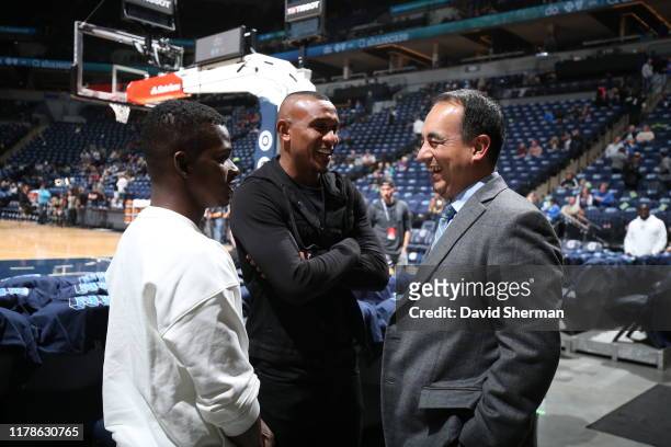 Minnesota United FC players Darwin Quintero and Angelo Rodriguez talk to Gersson Rosas prior to a game between the Miami Heat and Minnesota...