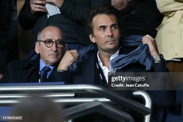 Director of Sports at Canal Plus Thierry Cheleman, Havas CEO Yannick Bollore attend the Ligue 1 match between Paris Saint-Germain and Olympique de...