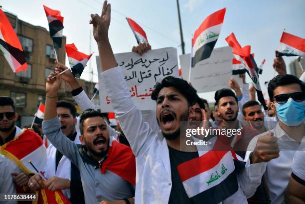 Iraqi medical students take part in an anti-government demonstration in the central holy shrine city of Najaf on October 28, 2019. Students and...