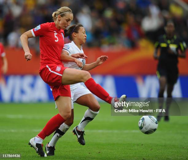 Faye White of England tackles Sarah Gregorius of New Zealand during the FIFA Women's World Cup 2011 Group B match between New Zealand and England at...
