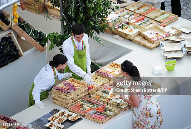 Well wishers enjoy the atmosphere during Prince Albert II of Monaco and Princess Charlene of Monaco's civil ceremony of their Royal Wedding at the...