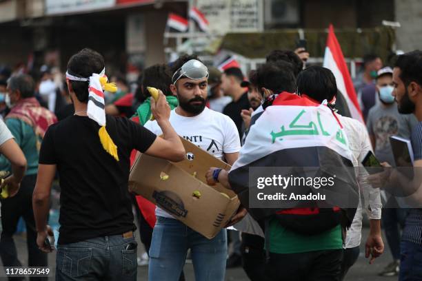 Iraqi protesters gather at Tahrir Sqaure during ongoing anti-government demonstrations in Iraq's capital Baghdad on October 28, 2019. Demonstrations...