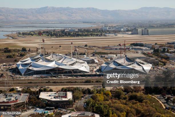 Buildings stand under construction at the Google campus in this aerial photograph taken above Mountain View, California, U.S., on Wednesday, Oct. 23,...